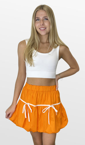 Bows and Bubble Hem Mini Skirt